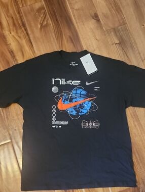 Brand NEW Nike Black Tee with Orange Swoosh & Blue Planet Graphic Med
